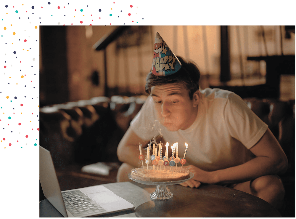 Teen with special needs blowing out his birthday candles - virtual programs for special needs