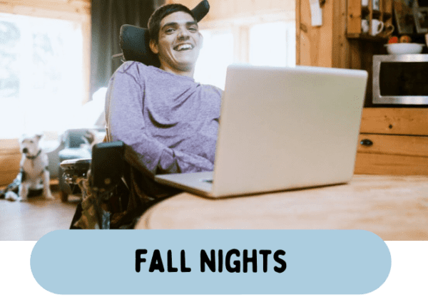 A man in a wheelchair smiling at a laptop with the text fall nights while enjoying his Clubhouse Membership.